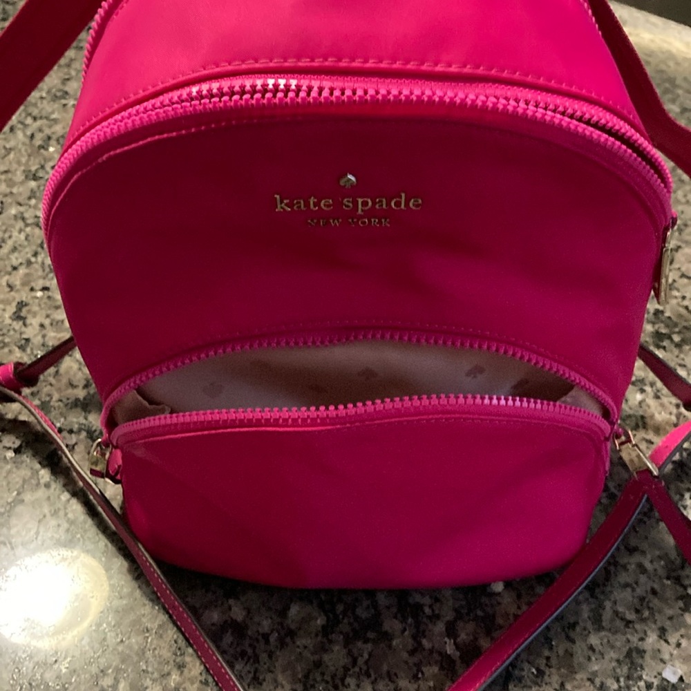 Kate Spade. Used but well kept.. Beautiful, vibrant color